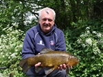 A 10lb tench with a little help from Fred J