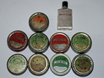 A collection of vintage line dressing tins